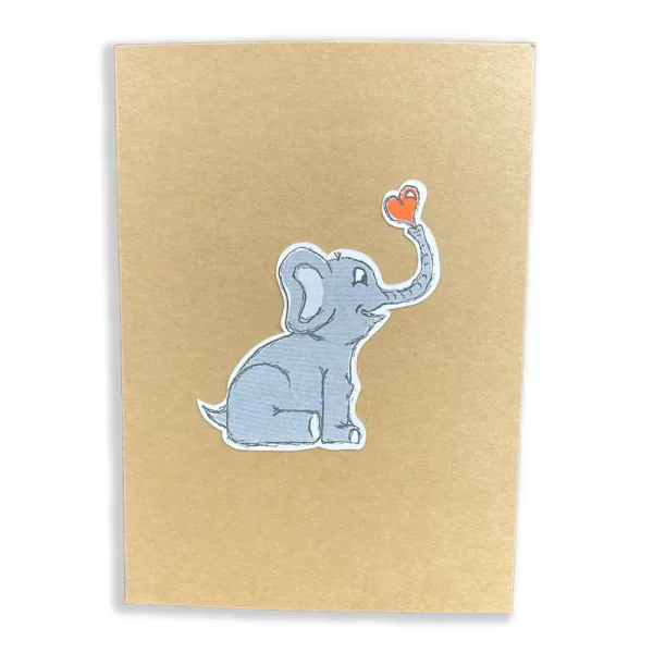 elephant blowing a heart